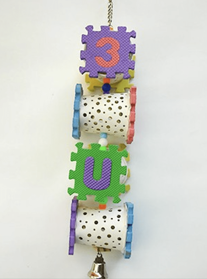 A colorful Cupow LG toy with the letters e and u hanging from it.